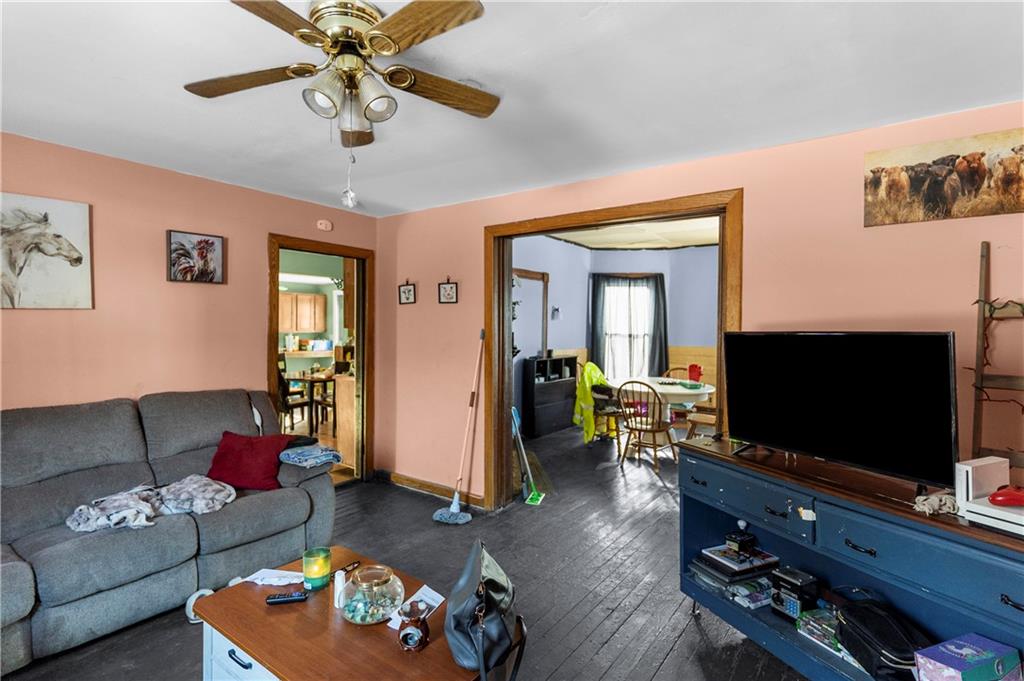 374 Harrison Street Sharon, PA 16146 - Photo 15 of 26 a living room with furniture and a flat screen tv