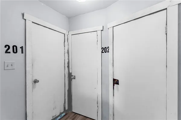 a bathroom with a glass shower door