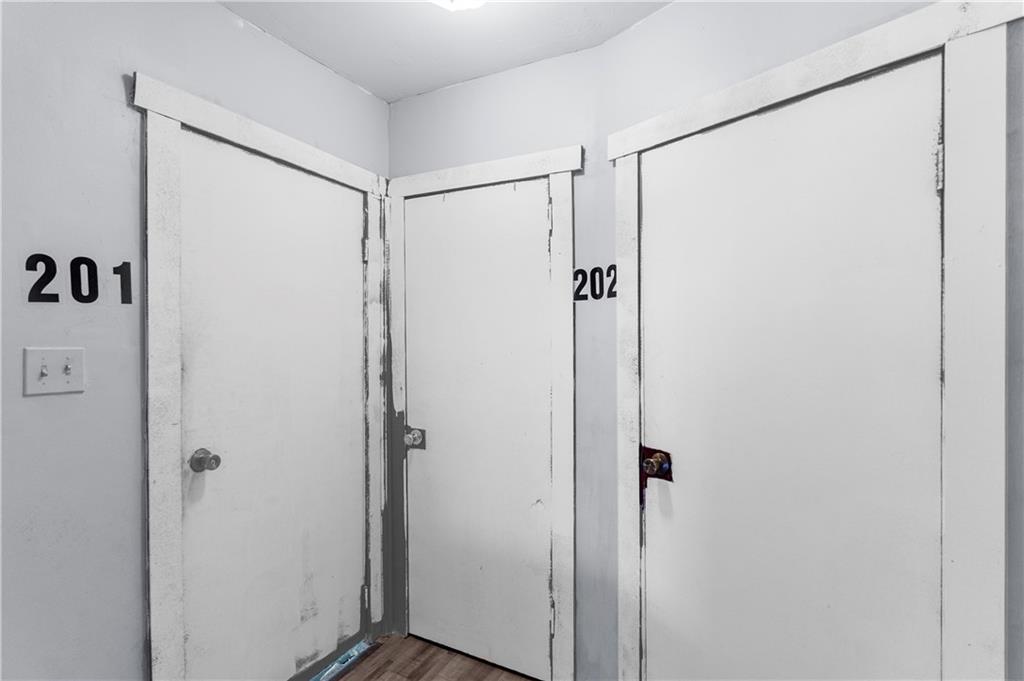 374 Harrison Street Sharon, PA 16146 - Photo 20 of 26 a bathroom with a glass shower door