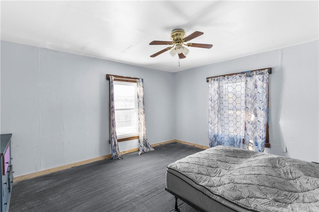 374 Harrison Street Sharon, PA 16146 - Photo 21 of 26 a bedroom with a bed and a window