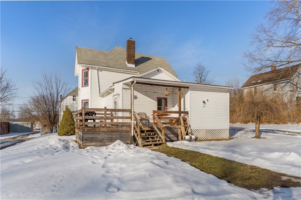 374 Harrison Street Sharon, PA 16146 - Photo 5 of 26 a view of a patio with a table and chairs