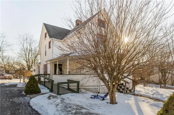 a view of a patio with a yard