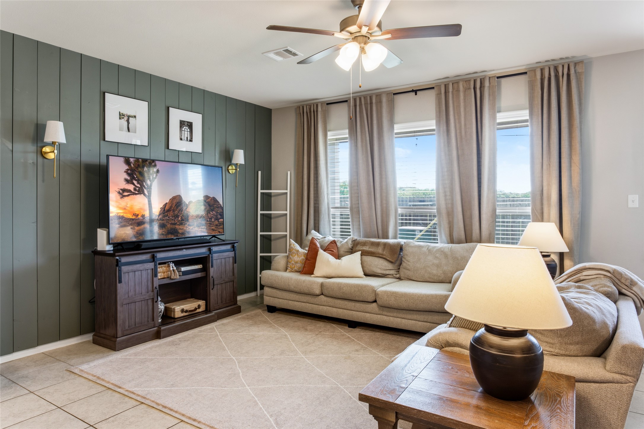 7254 Victorville Drive Rosharon, TX 77583 - Photo 3 of 27 a living room with furniture and a flat screen tv