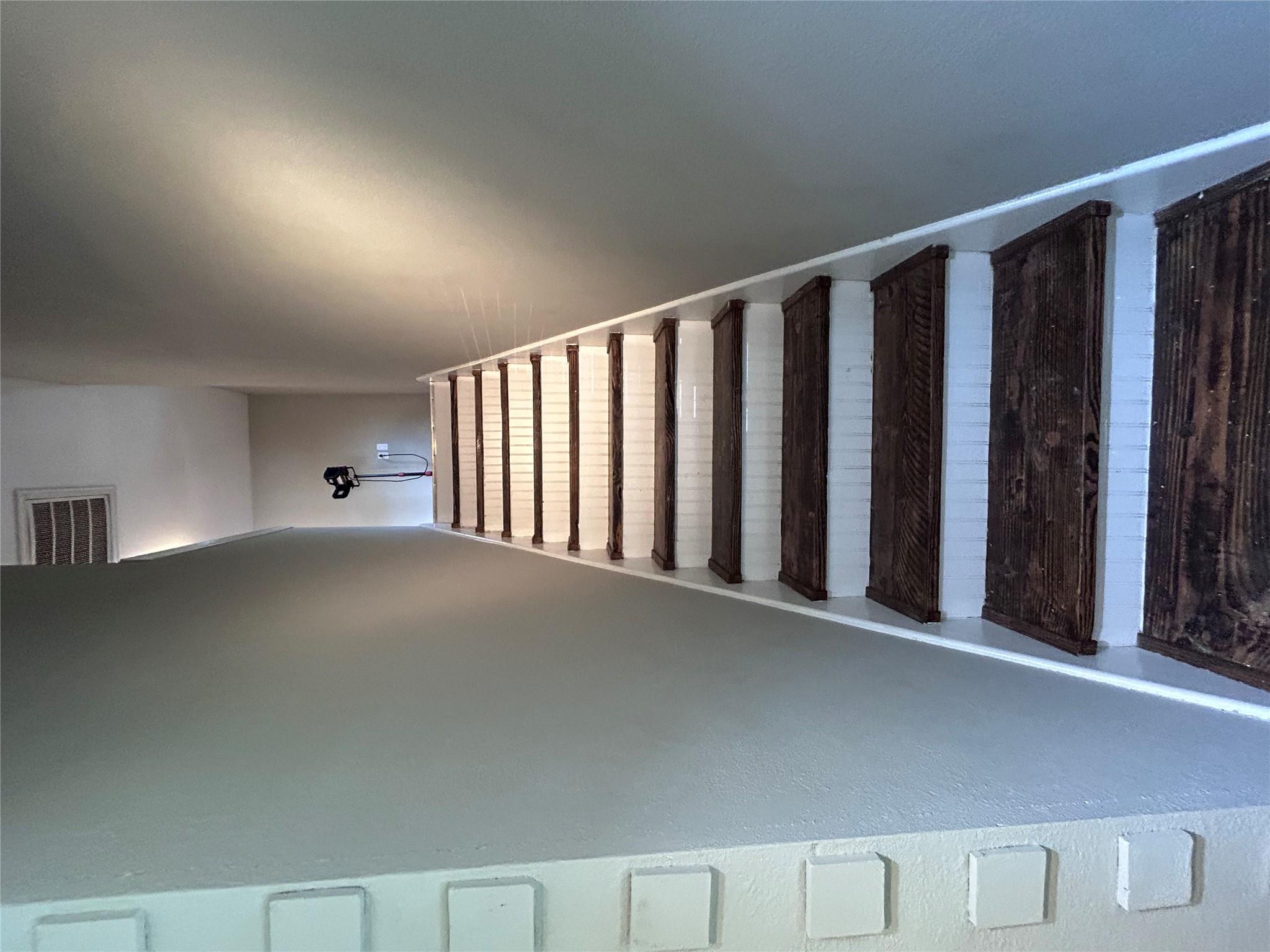 5708 Spring Meadow Road, Unit B Austin, TX 78744 - Photo 7 of 23 Stairs with baseboards