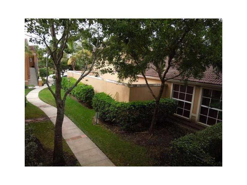 7940 North Nob Hill Road, Unit 204 Tamarac, FL 33321 - Photo 5 of 10 a view of a backyard