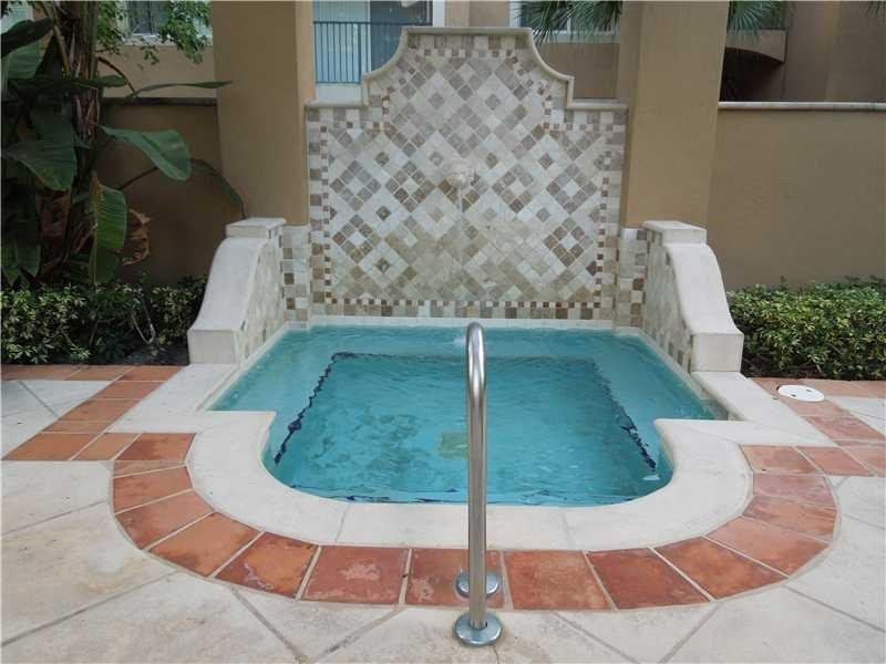 7940 North Nob Hill Road, Unit 204 Tamarac, FL 33321 - Photo 7 of 10 a view of a swimming pool