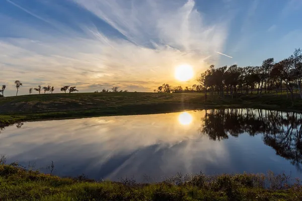 a view of lake with green space
