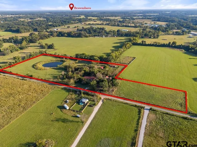 a view of a swimming pool with an ocean view