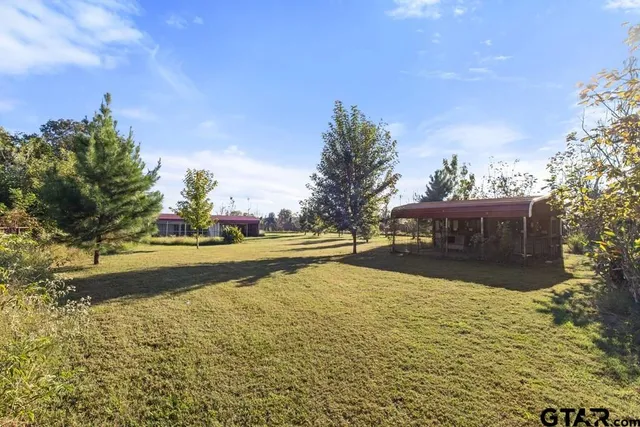 a view of swimming pool with an ocean view