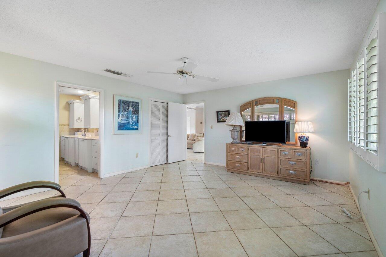 4022 Shell Drake Lane, Unit SHELLDRAKE Boynton Beach, FL 33436 - Photo 14 of 40 a view of living room with furniture and a window