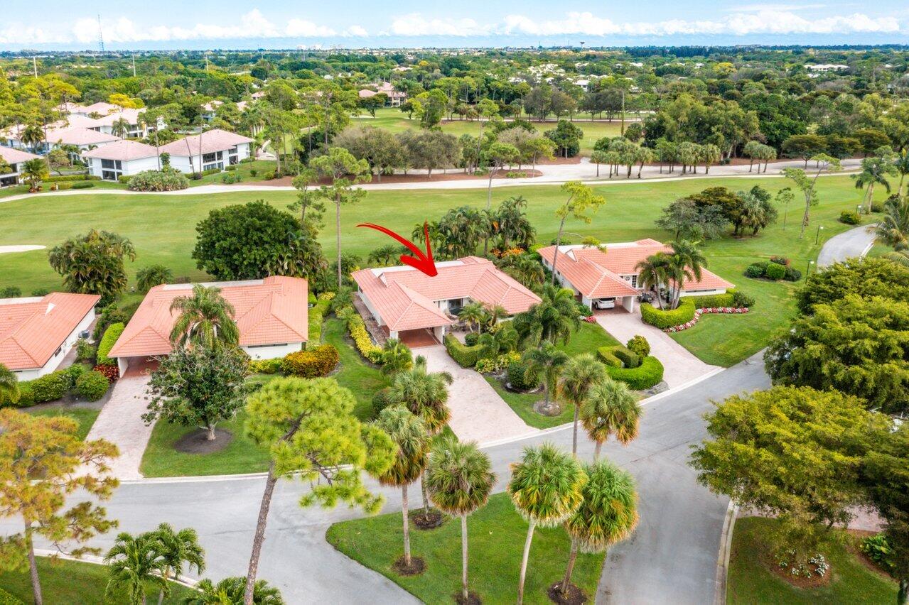 4022 Shell Drake Lane, Unit SHELLDRAKE Boynton Beach, FL 33436 - Photo 35 of 40 an aerial view of a house with yard swimming pool and outdoor seating