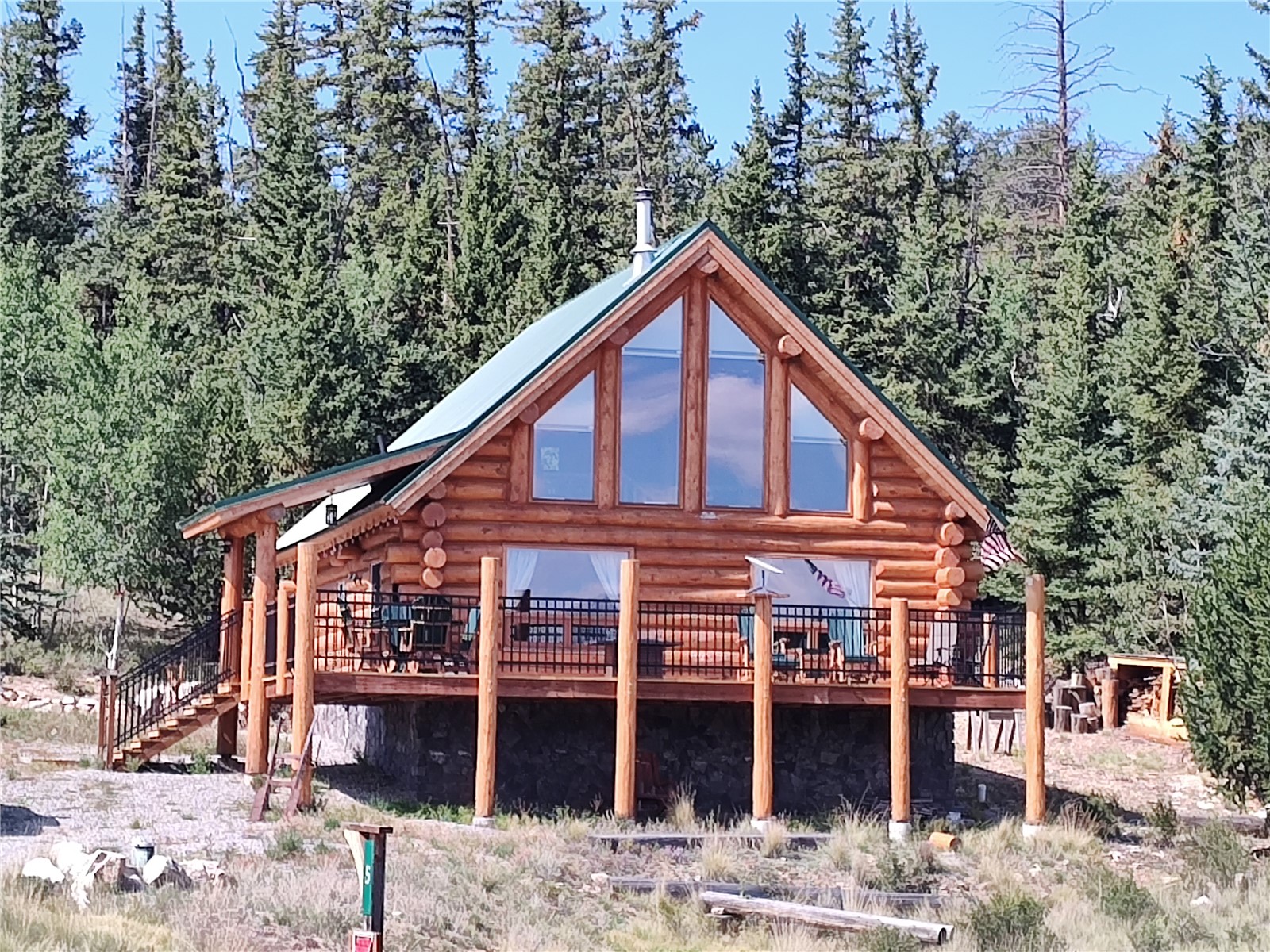 5 Arland Road Como, CO 80456 - Photo 2 of 33 a view of a house with large windows