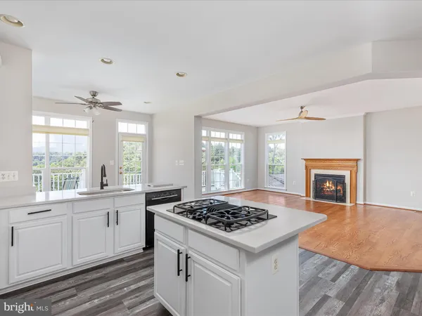 a kitchen with a stove and a sink