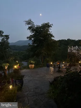 a view of a table and chairs in patio