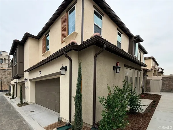 a house with trees in front of it