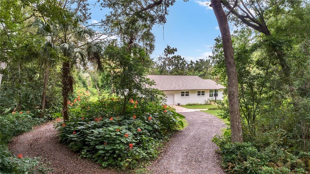 130 Calico Road Lake Mary, FL 32746 - Photo 1 of 1 Lush drive in.