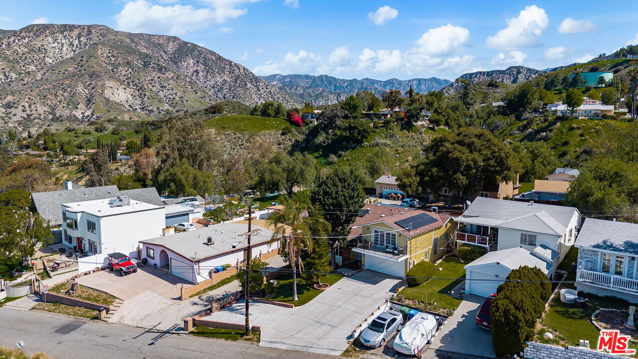 11080 Plainview Avenue Tujunga, CA 91042 - Photo 35 of 41 a view of a terrace with a bench