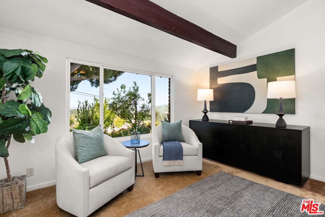 11080 Plainview Avenue Tujunga, CA 91042 - Photo 5 of 41 a living room with furniture potted plant and a large window