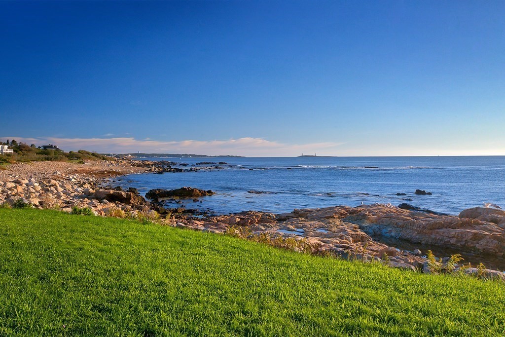 163 Atlantic Road, Unit 8 Gloucester, MA 01930 - Photo 21 of 21 a view of an ocean beach and mountain