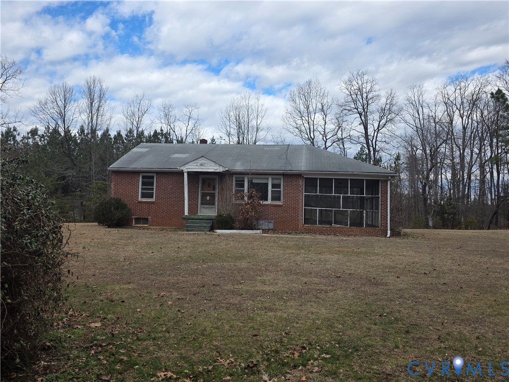 1429 Taro Road Cullen, VA 23934 - Photo 1 of 23 a front view of a house with yard and trees