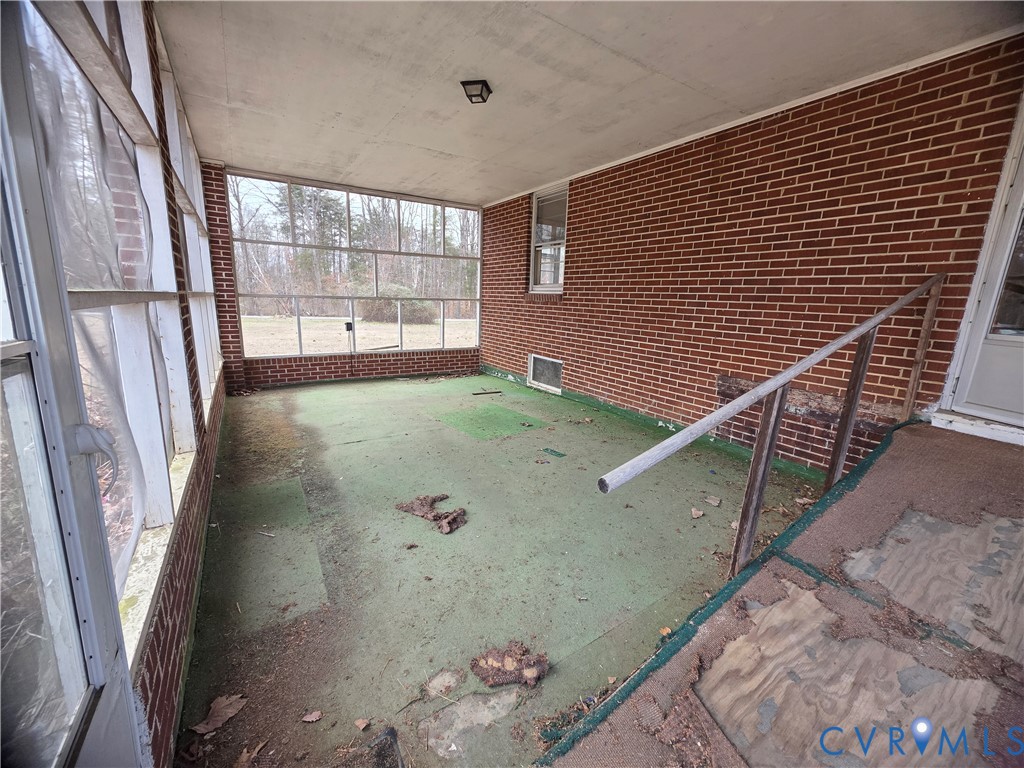 1429 Taro Road Cullen, VA 23934 - Photo 12 of 23 a view of a livingroom with wooden floor