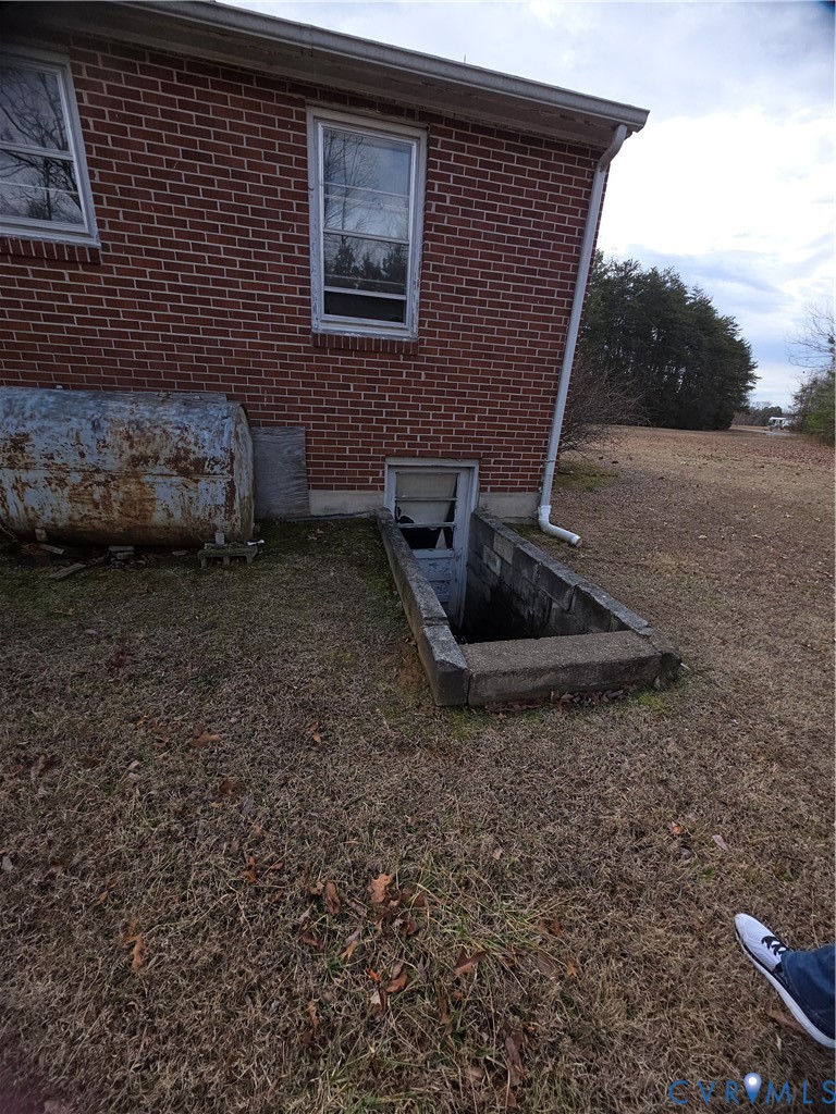 1429 Taro Road Cullen, VA 23934 - Photo 17 of 23 a view of backyard with barbeque grill