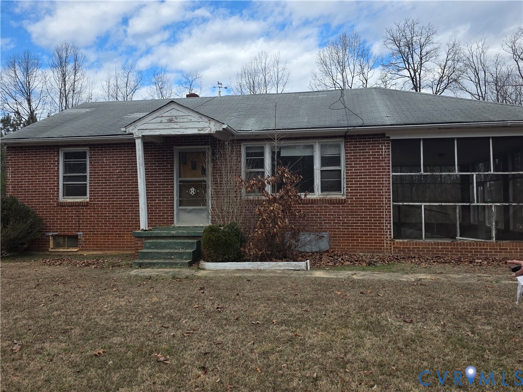 1429 Taro Road Cullen, VA 23934 - Photo 2 of 23 a front view of a house with garden