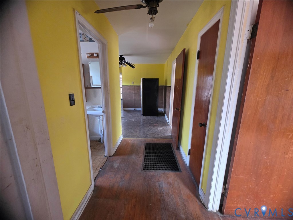 1429 Taro Road Cullen, VA 23934 - Photo 21 of 23 a view of a hallway with wooden floor
