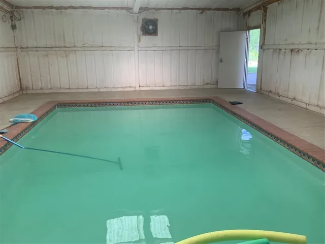 a bathroom with a toilet and a sink