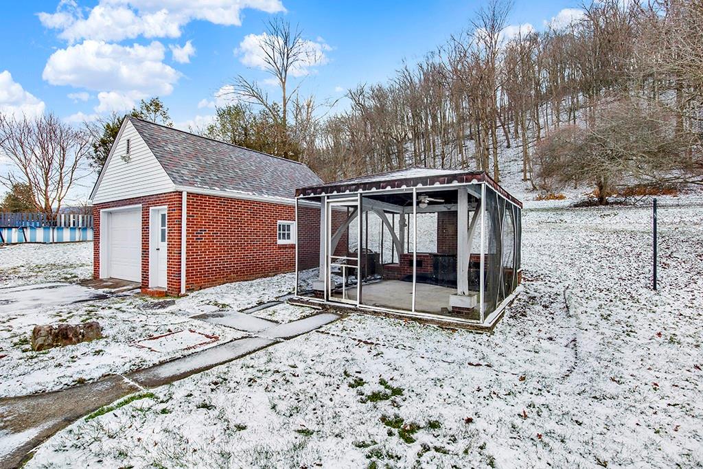 136 15th Street New Florence, PA 15944 - Photo 7 of 36 Screened-in detached porch.