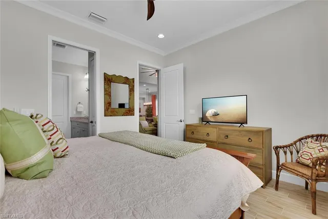 a bedroom with a bed and furniture