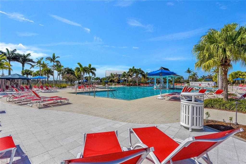 7110 Cayo Coco Lane Naples, FL 34113 - Photo 40 of 45 a view of a chairs and table in patio