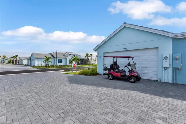 a view of a car in front of a house