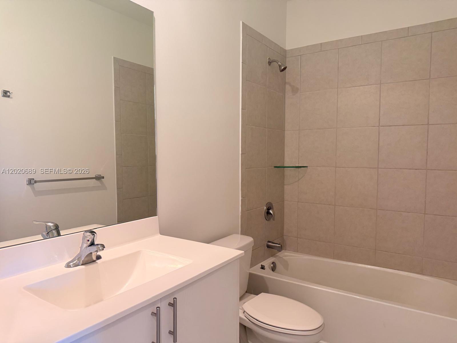 12875 Southwest 231st Terrace Miami, FL 33170 - Photo 23 of 25 a bathroom with a sink toilet and shower