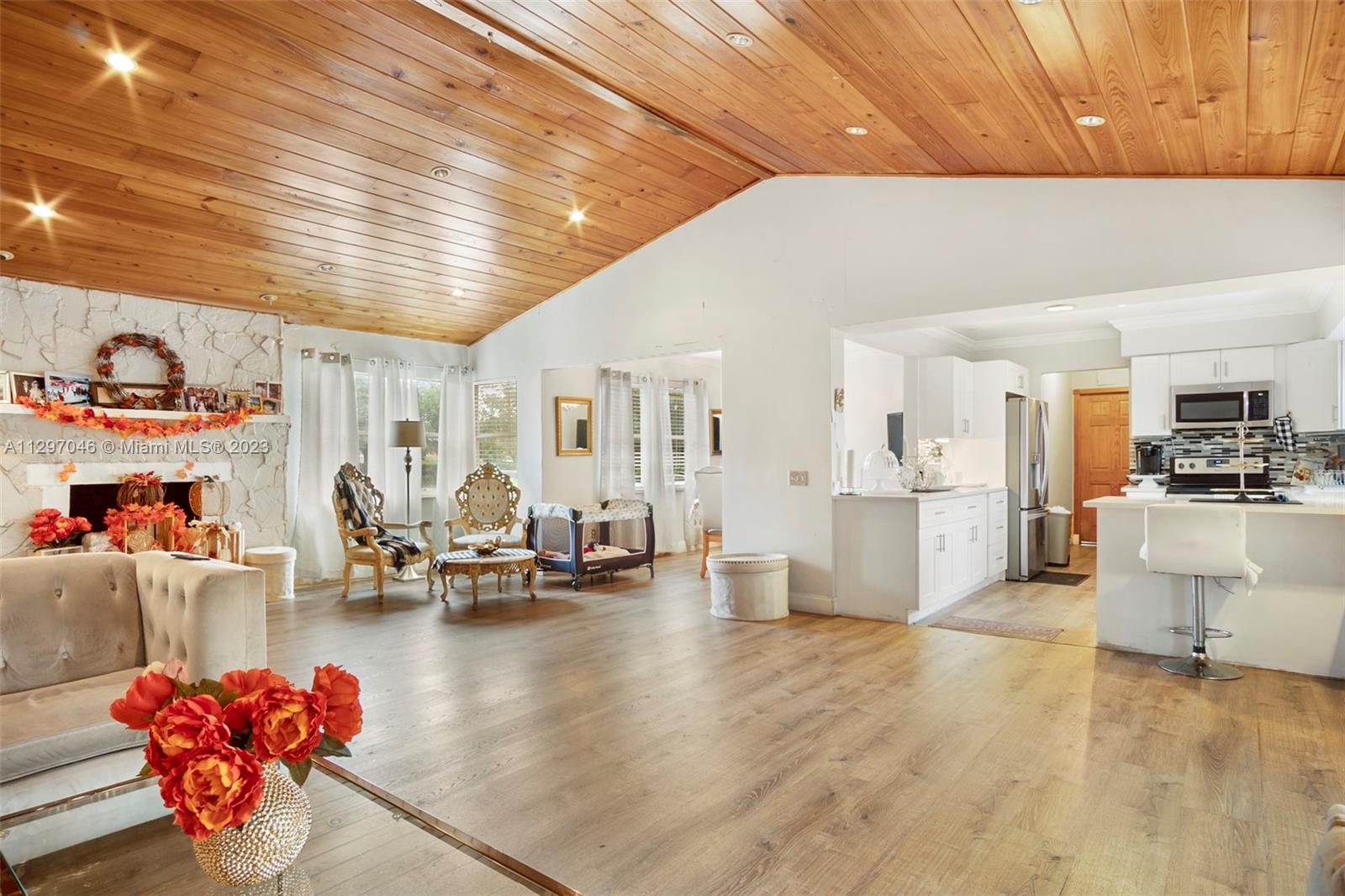 3457 Fillmore Street Hollywood, FL 33021 - Photo 4 of 18 a living room with furniture and view of kitchen