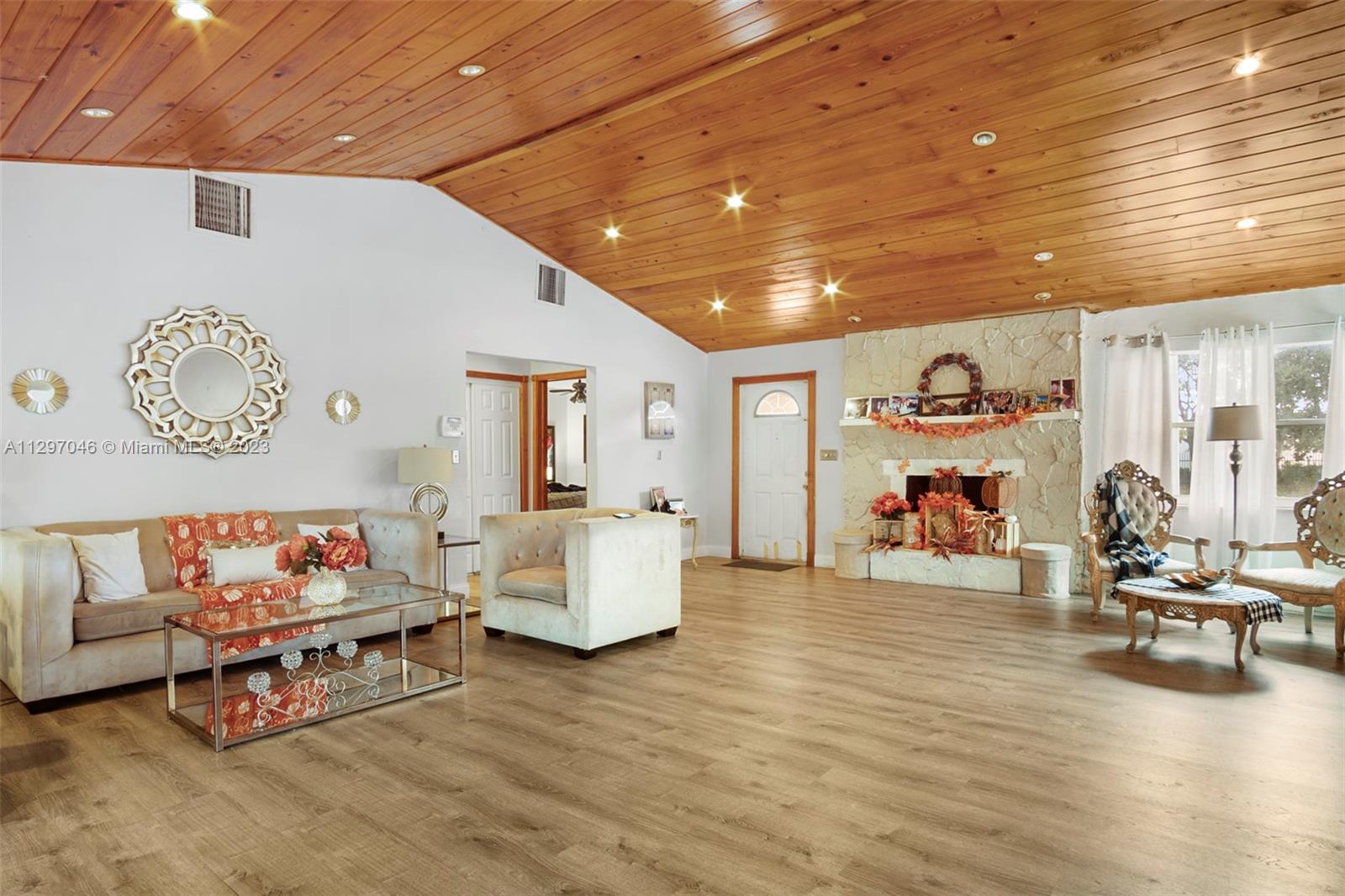 3457 Fillmore Street Hollywood, FL 33021 - Photo 5 of 18 a living room with furniture and a wooden floor