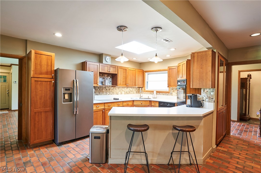 3288 Spring Valley Road Akron, OH 44333 - Photo 10 of 45 Kitchen Island with stools