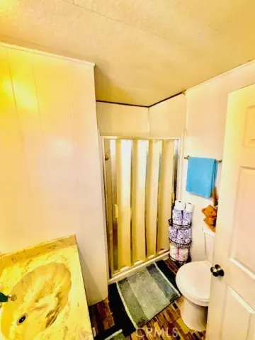 a bathroom with a sink and toilet