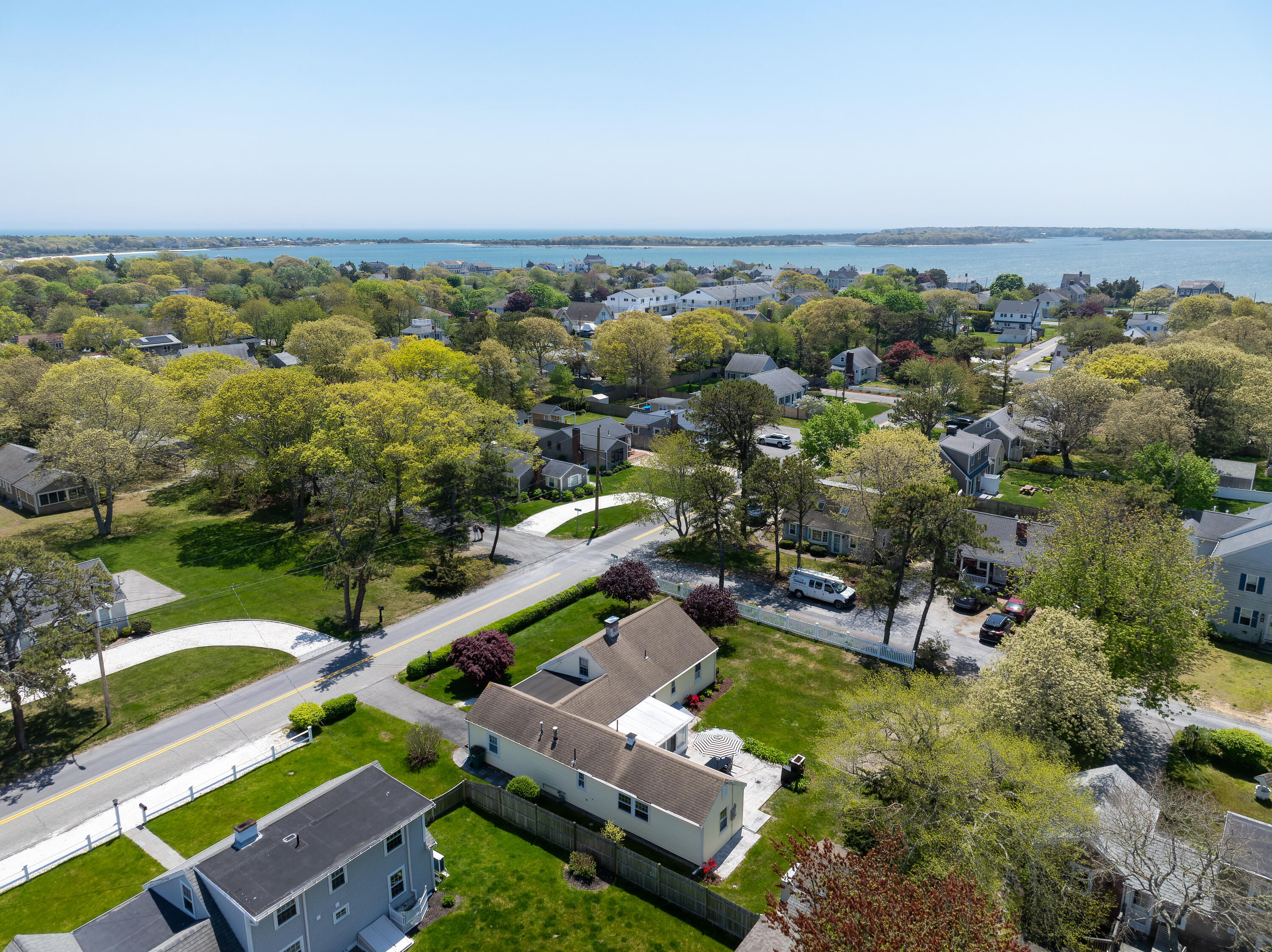 111 Lewis Road West Yarmouth, MA 02673 - Photo 6 of 43 an aerial view of multiple house with a yard