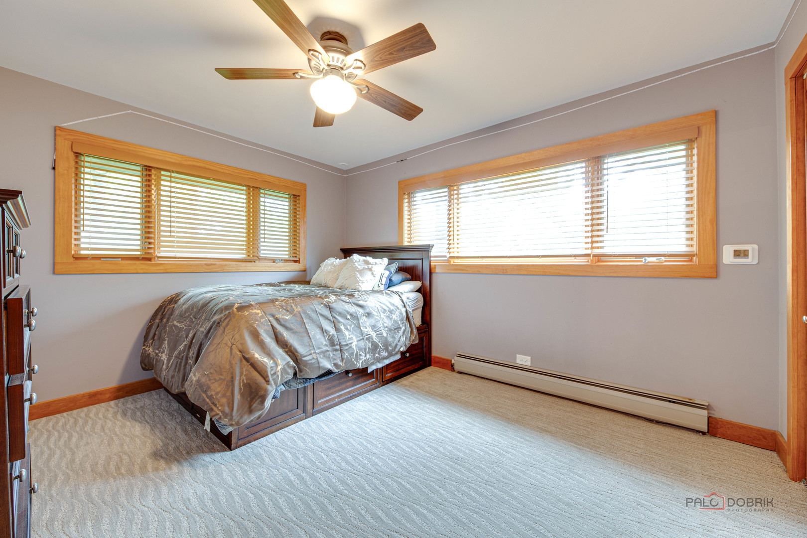 25909 West Sunset Road Barrington, IL 60010 - Photo 28 of 50 a bedroom with a bed and a ceiling fan
