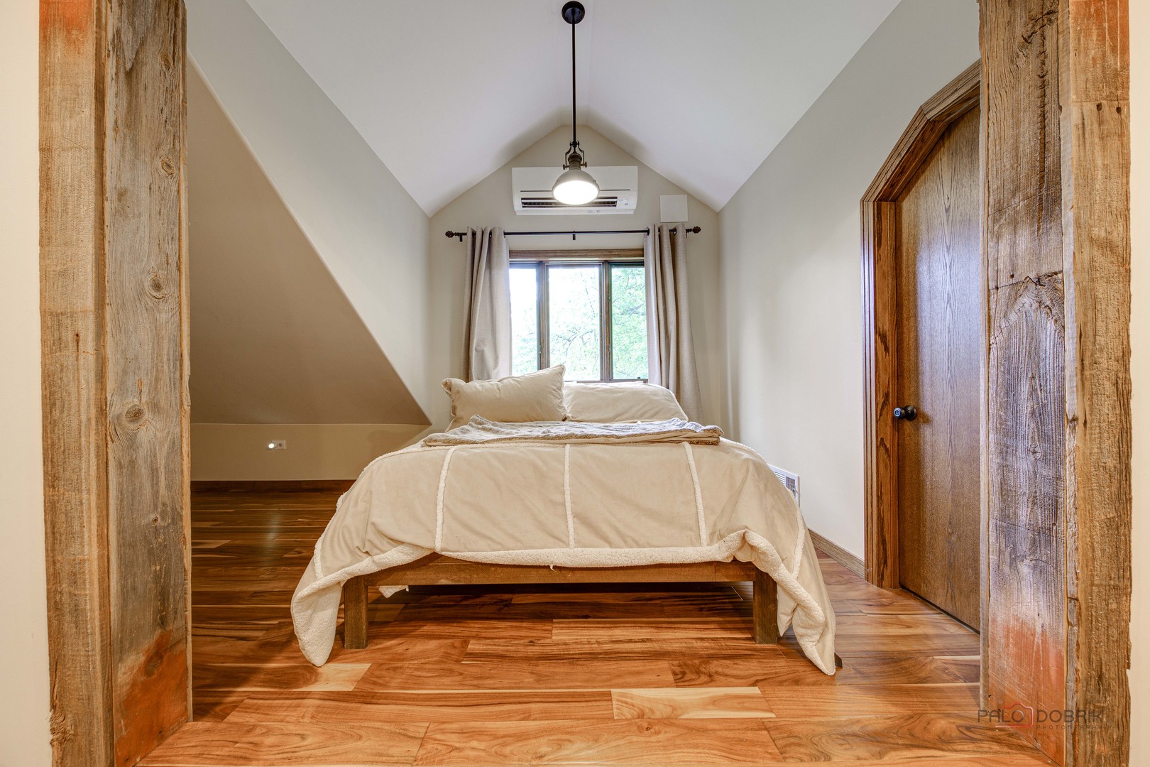 25909 West Sunset Road Barrington, IL 60010 - Photo 36 of 50 a spacious bedroom with a bed and a window