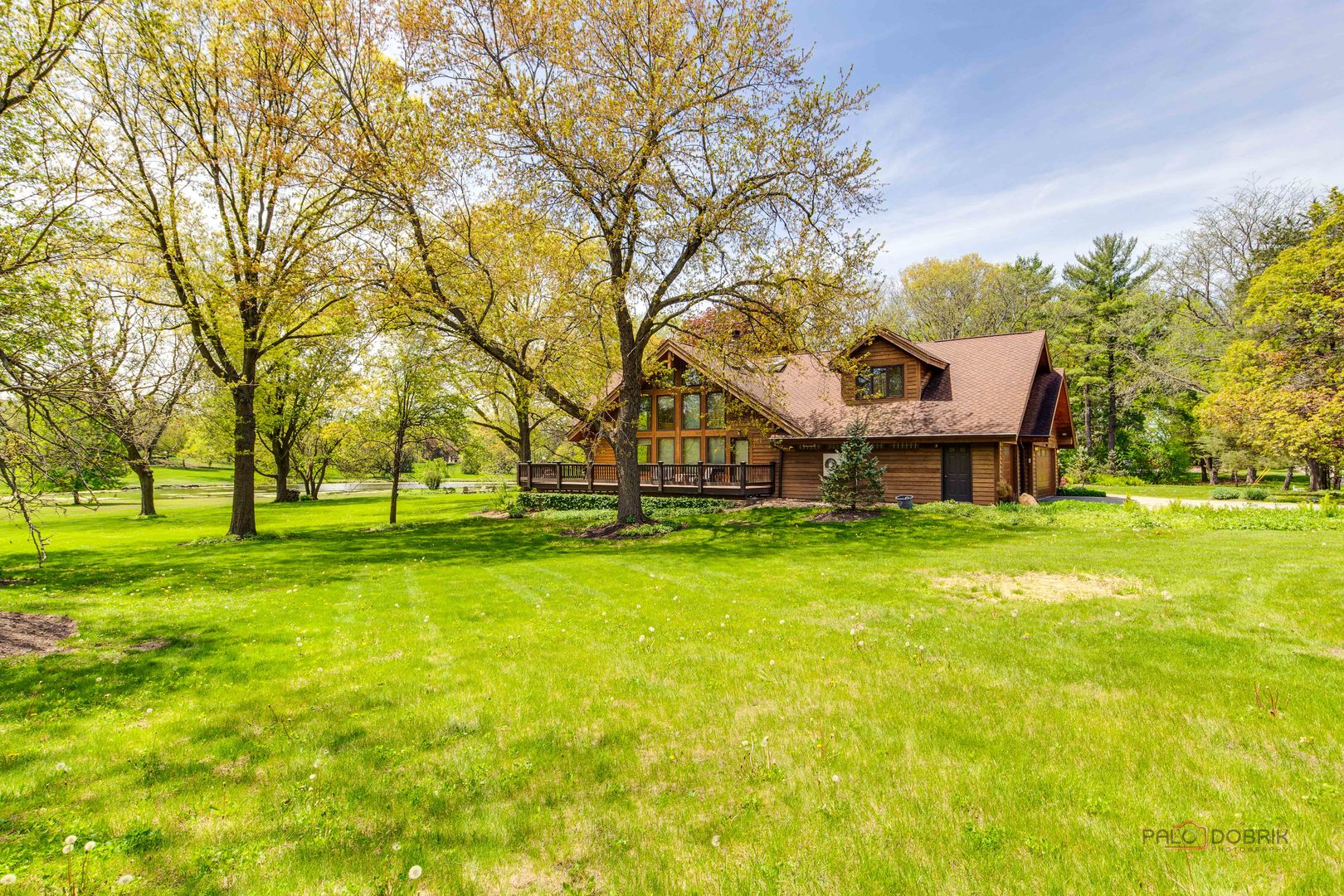 25909 West Sunset Road Barrington, IL 60010 - Photo 44 of 50 a view of a house with a big yard