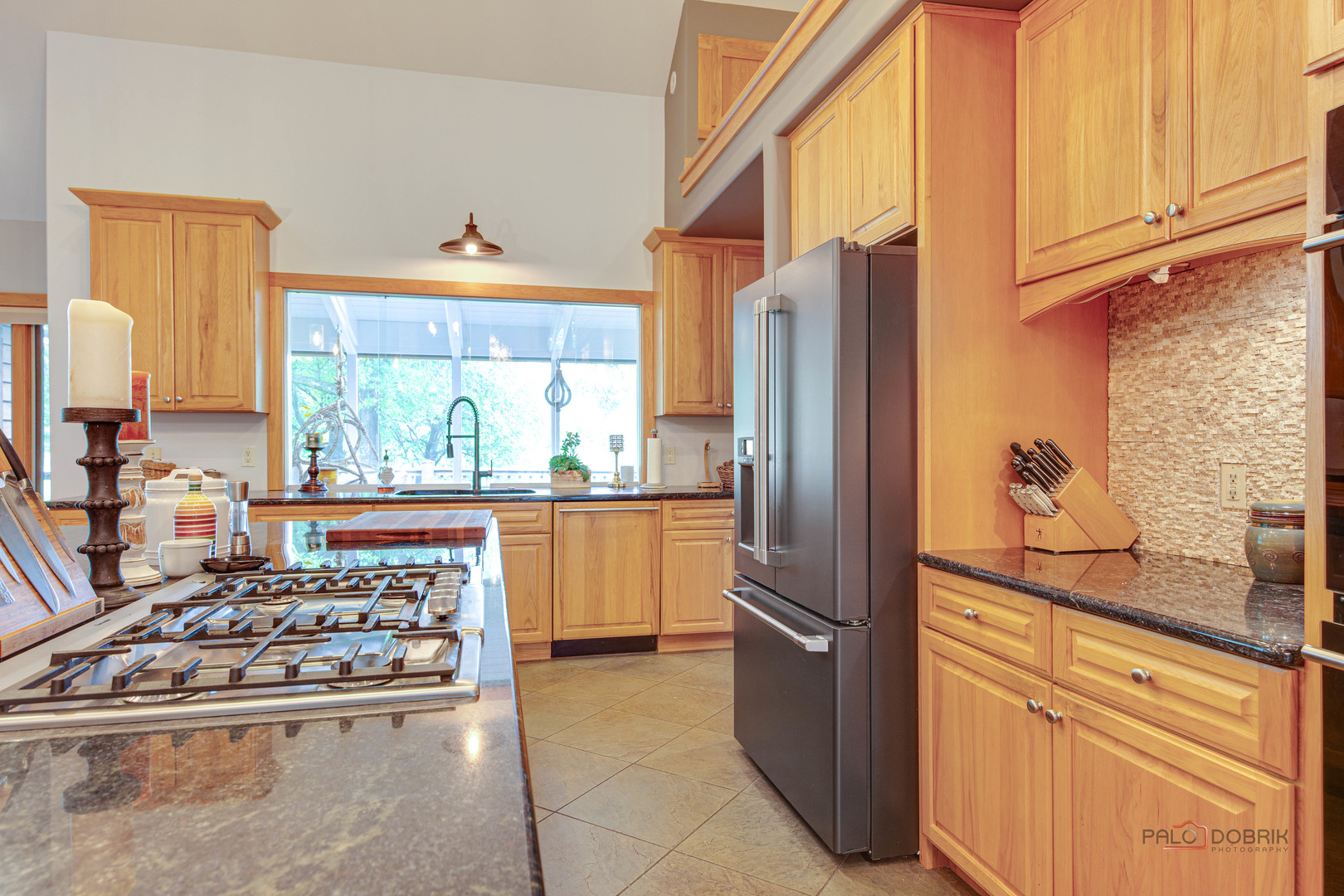 25909 West Sunset Road Barrington, IL 60010 - Photo 8 of 50 a kitchen with stainless steel appliances granite countertop a refrigerator and a stove