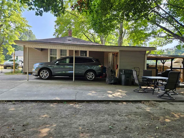 a car parked in front of a house