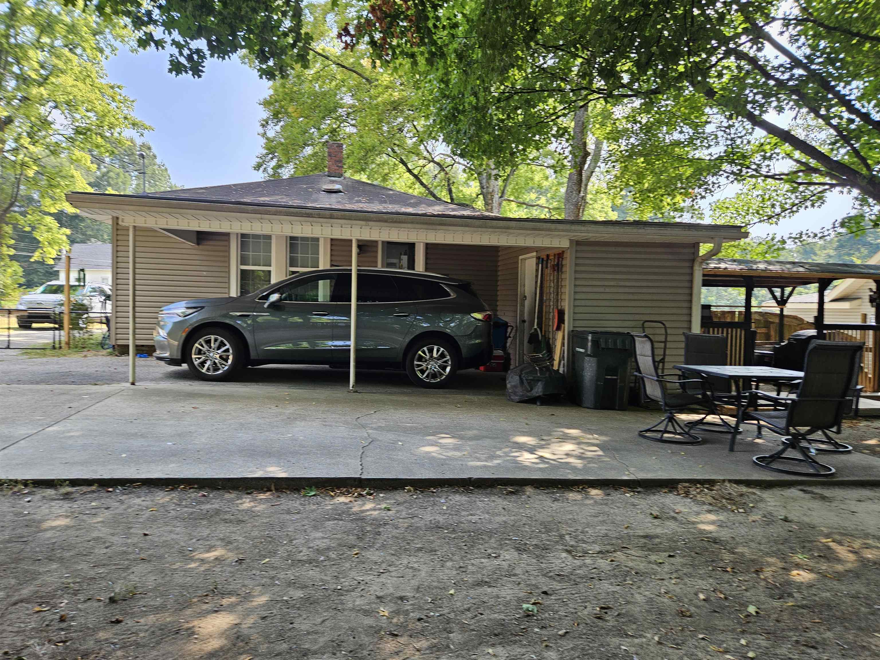 141 Tucker Avenue Ripley, TN 38063 - Photo 13 of 14 a car parked in front of a house