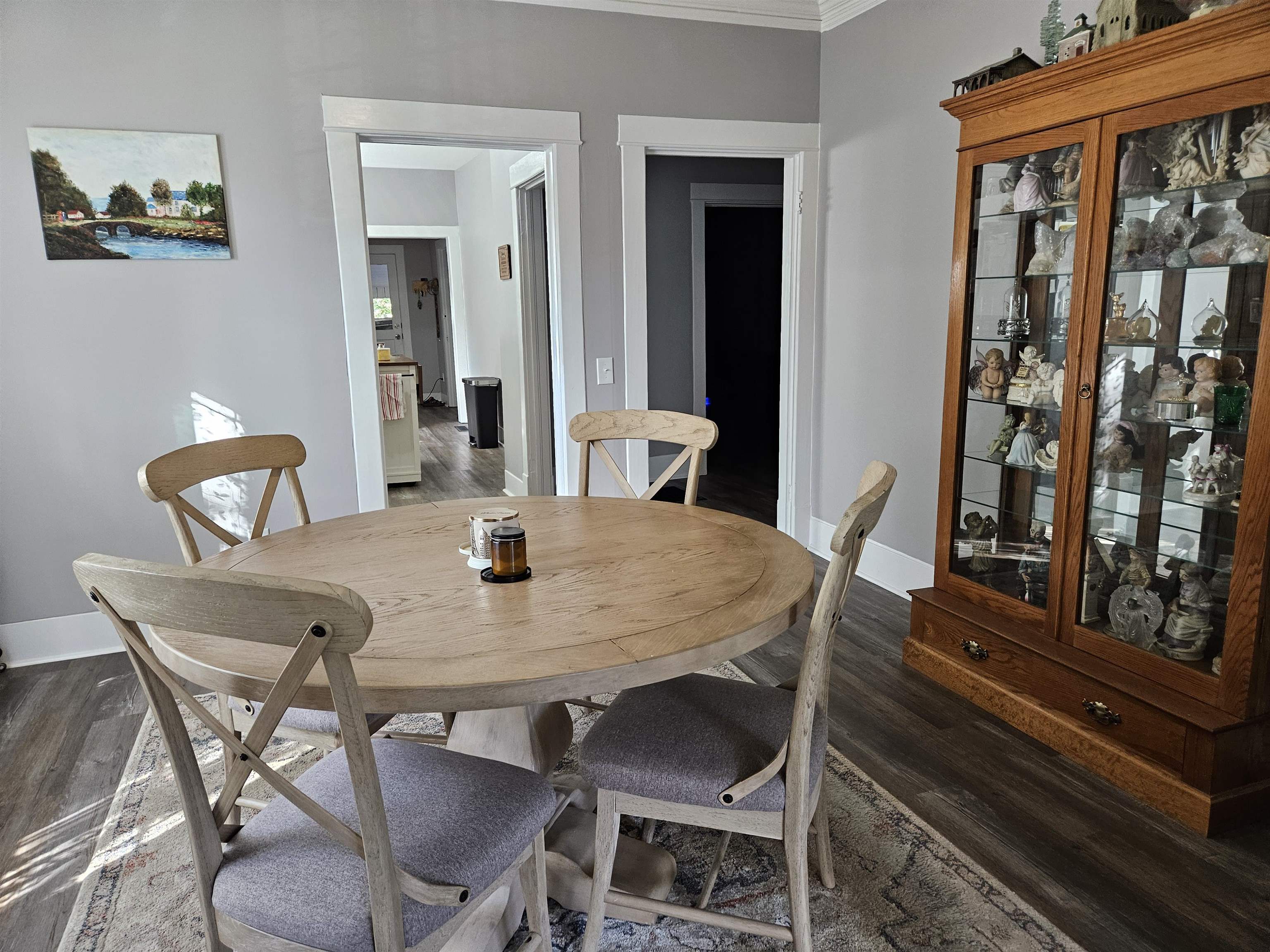 141 Tucker Avenue Ripley, TN 38063 - Photo 5 of 14 a view of a dining room with furniture and wooden floor