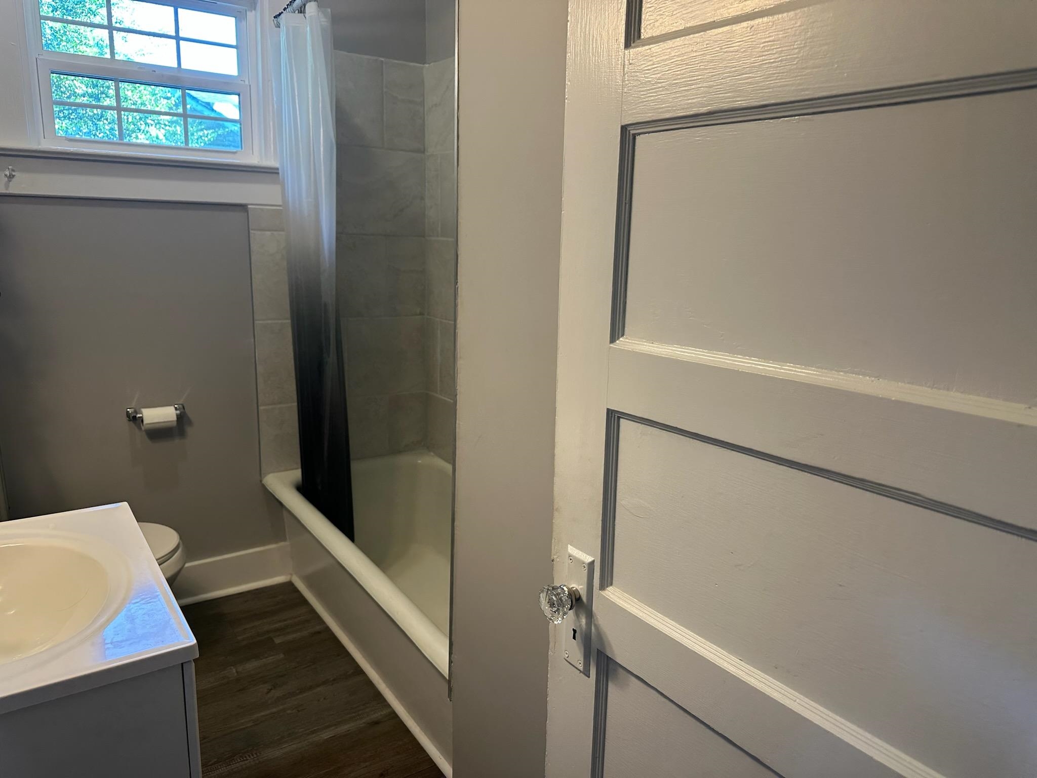 141 Tucker Avenue Ripley, TN 38063 - Photo 8 of 14 a bathroom with a sink and a shower