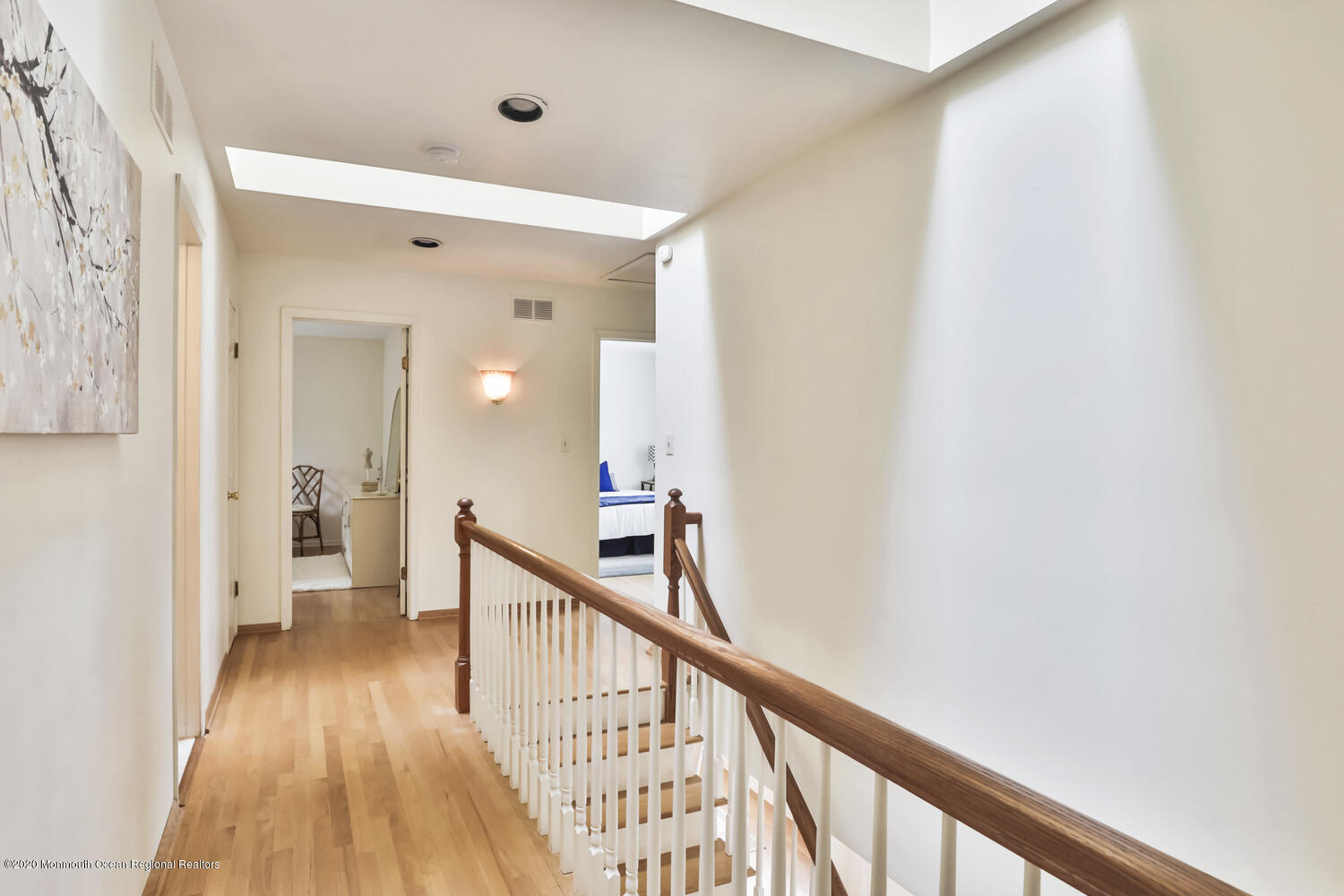 38 Knob Hill Road Morganville, NJ 07751 - Photo 18 of 35 a view of a hallway with wooden floor and staircase