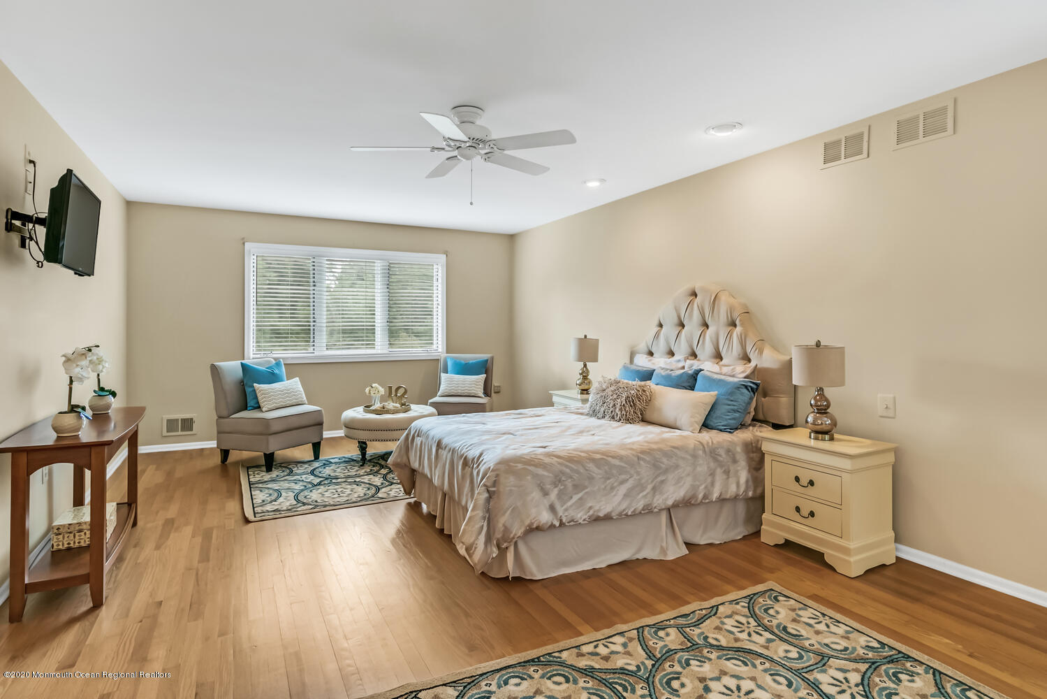 38 Knob Hill Road Morganville, NJ 07751 - Photo 19 of 35 a bedroom with a bed and wooden floor