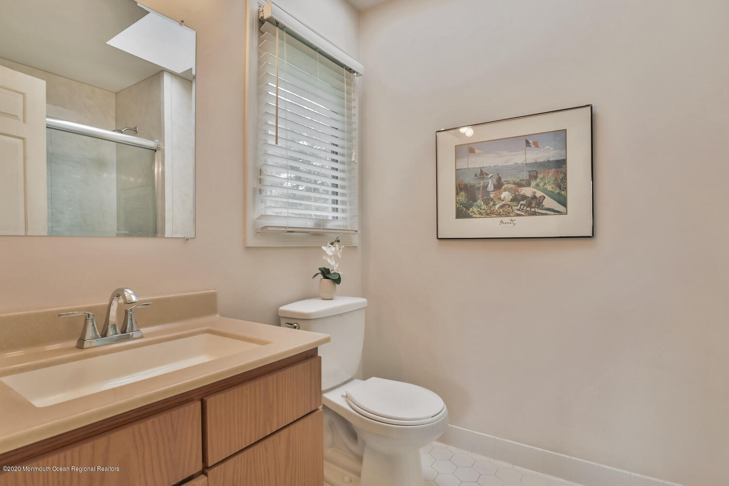 38 Knob Hill Road Morganville, NJ 07751 - Photo 21 of 35 a bathroom with a sink and a toilet